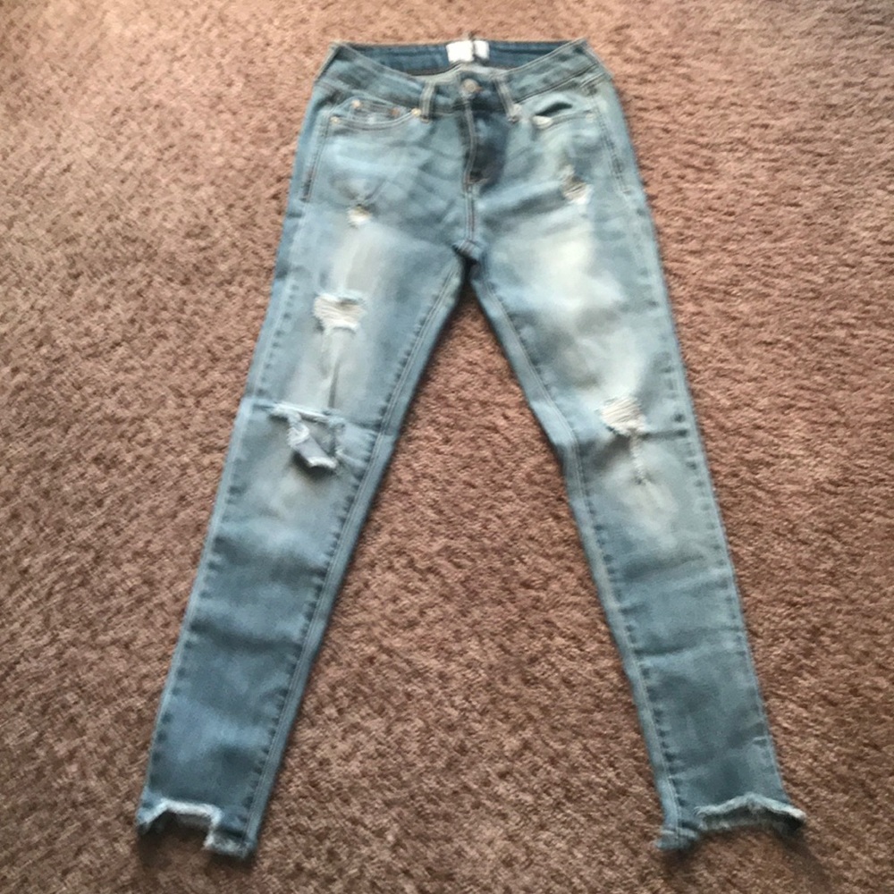 Distress mid rise ankle skinny jeans